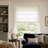 Natural beige linen Roman blind with soft light filtering and horizontal folds
